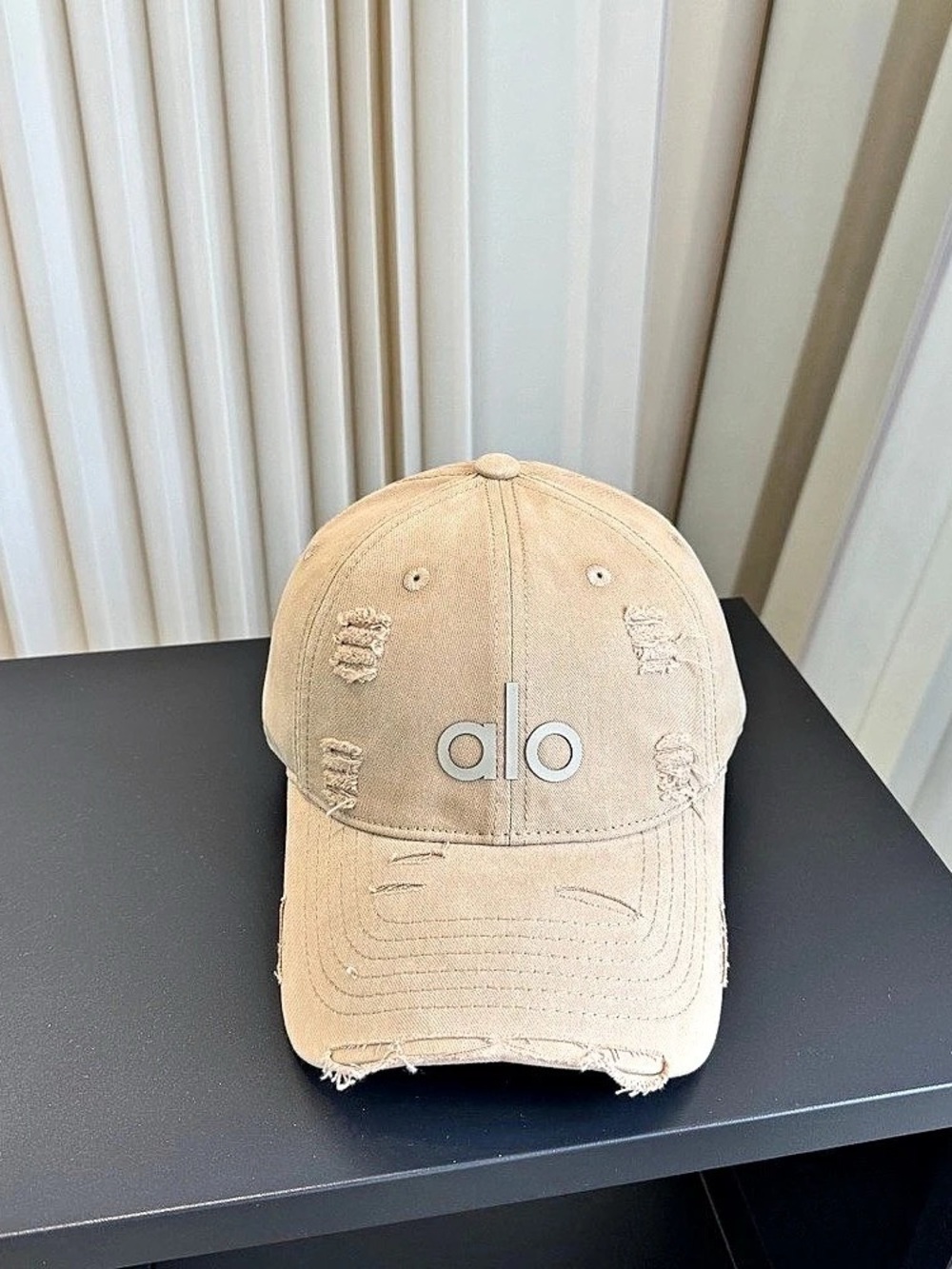Alo Distressed Logo Hat in Beige